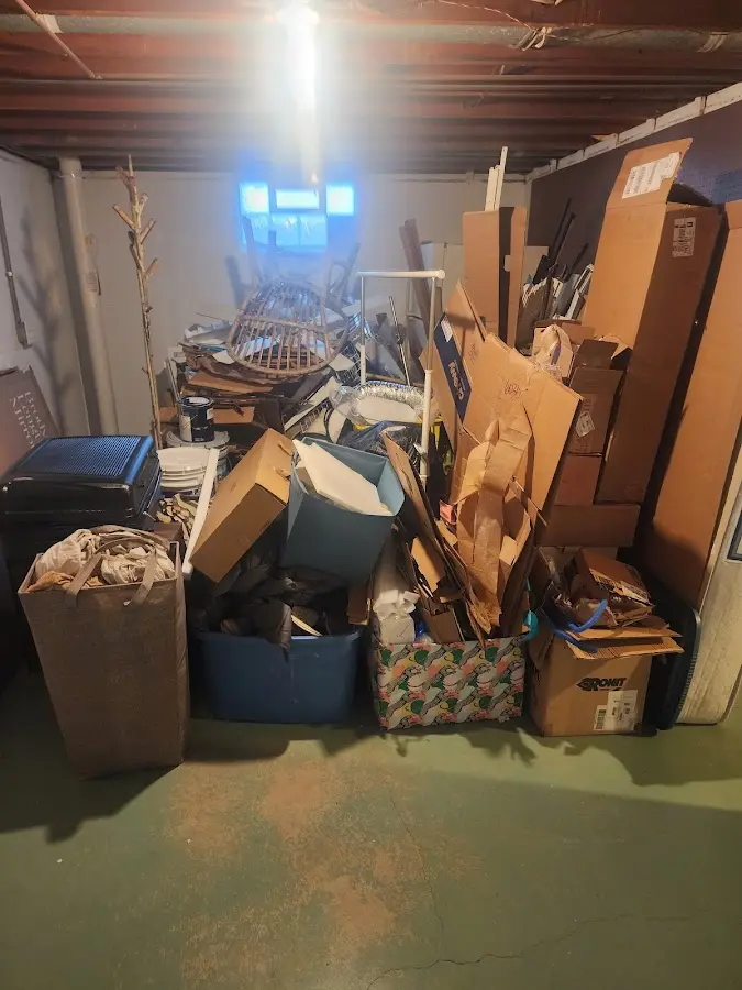 Roll-off dumpster container at job site for Yard Waste Dumpster Rental in Corcoran